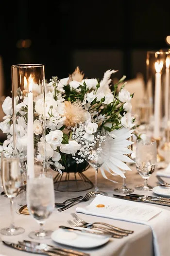 Close up of tabletop and floral decor for a wedding at Hotel Jerome, in Aspen, Colorado